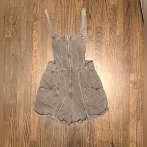 Free People Gray romper with zip front, drawstring waist, open back, drop pocket